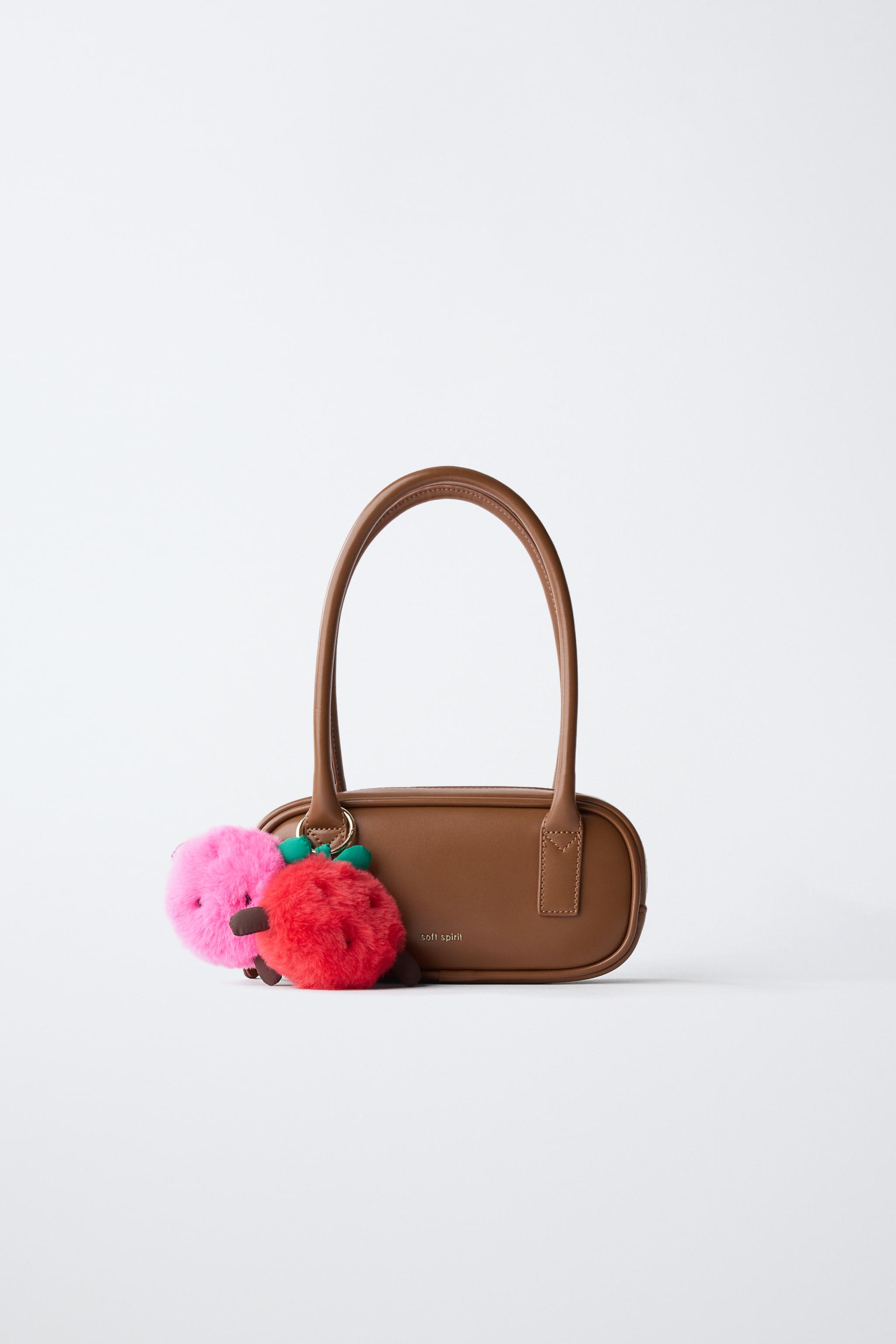 SAC À ÉPAULE POMPONS